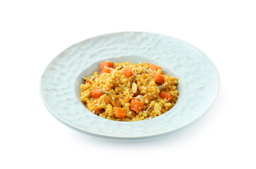Delicious pumpkin risotto in bowl isolated on white