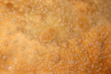 fried pastry details. pastry texture. food details. close up on food.