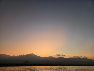 Hazy sunset over a volcano