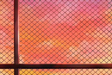 屋上(フェンス)夕　夕焼けのイラスト背景素材