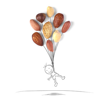 Conceptual boy holding a bunch of balloons floating into the air