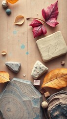 This visually appealing image showcases a harmonious arrangement of natural elements. The contrasting textures of rough stones, soft leaves, and earthy tones create a serene and balanced composition. 
