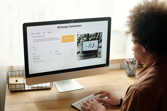 Desktop computer with AI image generator on screen standing on workplace of home office designer