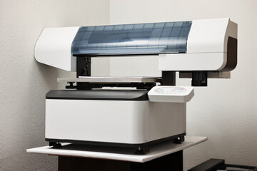 One modern printer in room. Printing equipment