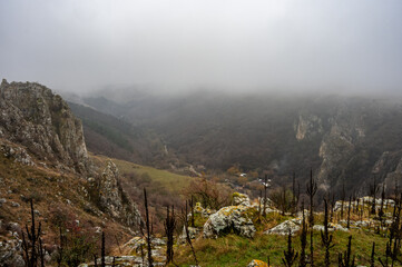 Scenic view of Tureni gorges with fog covering the valley, a natural reserve located in cluj county, transylvania