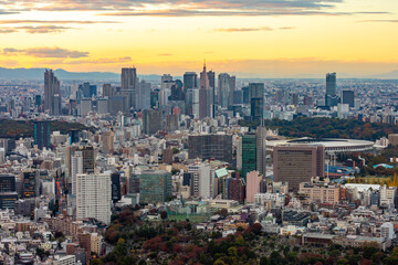 Naklejka premium Tokyo skyline with Shinjuku district skyscrapers at sunset, Japan