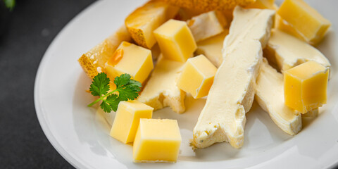 Cheese plate French cheeses fresh tasty food dish delicious gourmet food background on the table rustic food top view copy space