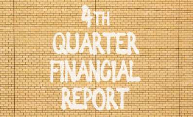 4th quarter financial report symbol. Concept words 4th quarter financial report on beautiful brick...