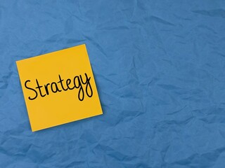 create the perfect business strategy. the inscription strategy on office paper. business planning....