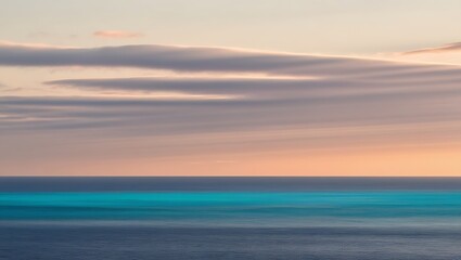 Fototapeta premium Serene Sunset Sky Over Calm Ocean Waters