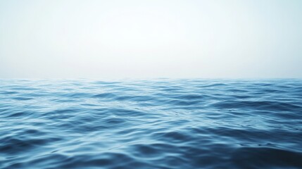 Obraz premium Serene ocean waves under a clear sky.