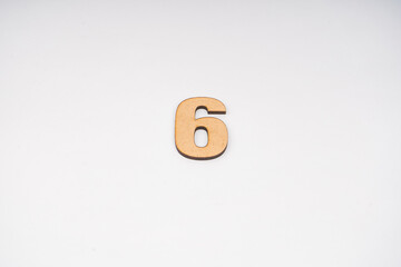 Number six in paper on white background