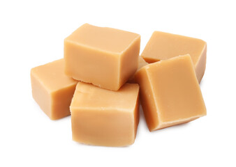 Tasty sweet caramel candies isolated on white
