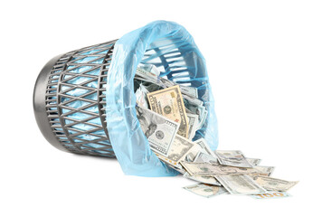 Many dollar banknotes and overturned trash bin isolated on white
