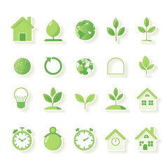 A collection of green icons including a house, a clock, a tree, and a globe