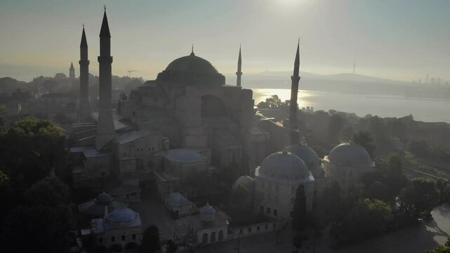 Aerial view of Hagia Sofia Mosque, Sunrise time, Istanbul historical center and Bosphorus in Istanbul, Turkey, Turkiye.
