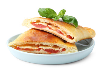 Pieces of tasty vegetarian calzone with tomato, cheese and basil isolated on white