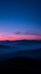 Obraz premium Burgundy and deep blue landscape captures the dreamlike beauty of blue hour
