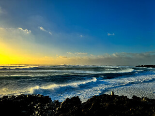Obraz premium Sunset on a volcanic island