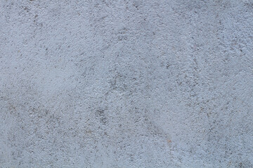 Fototapeta premium Close-up view of a textured gray concrete wall