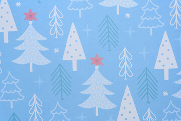Obraz premium decorative holiday scrapbooking paper background - christmas trees on blue