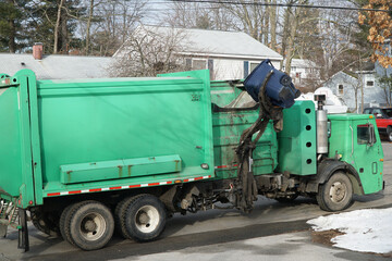 waste collecting truck in residential area