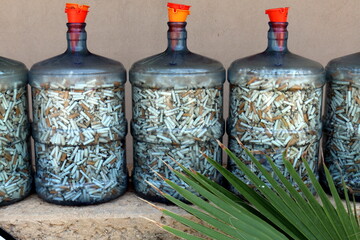 cigarette butts in an ashtray