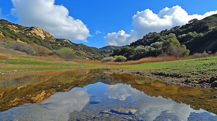Fototapeta premium Serene landscape reflecting in calm water.