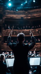 Orchestra conductor leading a performance on stage.