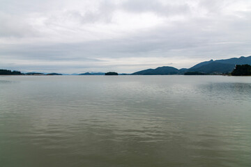 Fototapeta premium tranquil seascape with islands on a cloudy day