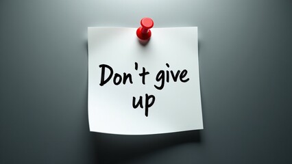 Close-up of a white post-it note with the phrase "Don't give up" handwritten in bold black ink, pinned to a gray metal surface with a red push pin. Elegant lighting highlights.