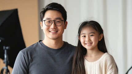 Joyful portrait of a father and daughter studio setting family photo natural light warm atmosphere bonding moment