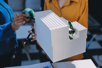 ESG environmental social governance display on laptop on eco-friendly company meeting with business people implementing environmental protection for clean and sustainable future ecology. Trailblazing