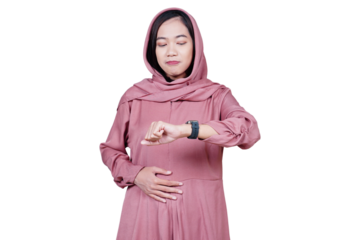 Asian Muslim woman holding alarm clock, waiting for Iftar time isolated transparent