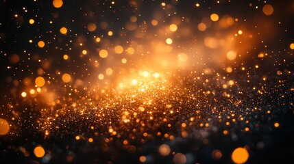 Fototapeta premium A mesmerizing display of shimmering golden particles against a dark background.