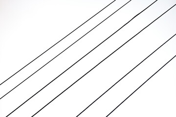 Fototapeta premium A minimalist abstract image featuring parallel lines against a white background. A simple yet striking composition.