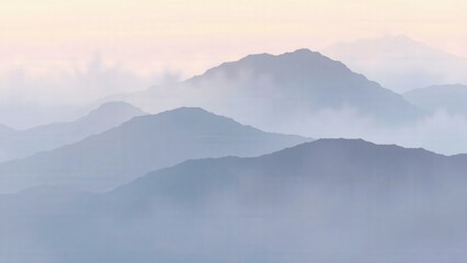 Obraz premium Misty Mountain Silhouettes: A Serene Landscape for Nature Lovers and Interior Design