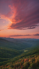 Obraz premium Scenic Mountain Landscape at Sunrise with Misty Valley and Clouds