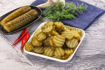 Sliced marinated cucumbers in the bowl