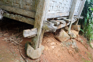Traditional wooden house leg construction using wooden pegs instead of nails, highlighting...