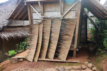 A traditional roof made from woven sago leaves provides shelter and charm. Its intricate design...
