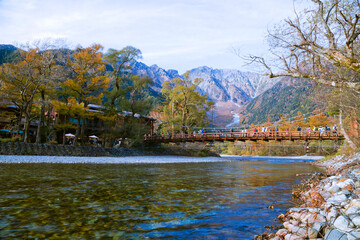 Tourists on the kappa wooden bridge at Kamikochi National park, the northern part of the Japan Alps in Chubu region.