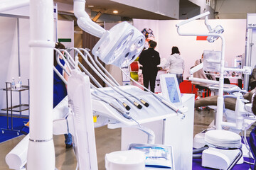 Modern dental unit. Height adjustable dental unit handpiece holders.