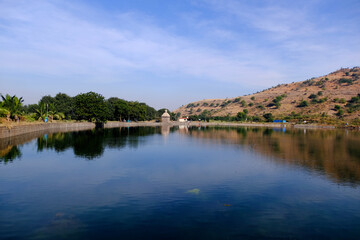 Fototapeta premium 8 December 2024, Pune, Maharashtra, India, historical Mastani Lake, also known as Mastani Talab, is situated near Wadki village, It was built around 1720 during the reign of Bajirao Peshwa.