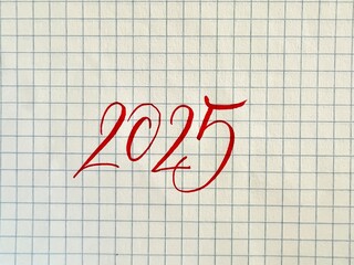 New Year 2025 handwritten numbers on paper 