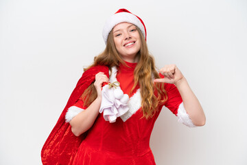 Young caucasian woman with Christmas dress holding Christmas sack isolated on white background...