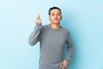 Caucasian man over isolated background making Italian gesture