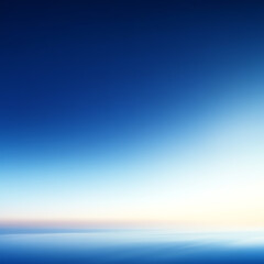 Fototapeta premium A serene horizon with a gradient of blue and soft pastel colors at sunset.
