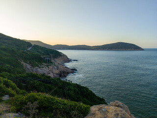Serene Coastal View at Sunset Overlooking Tranquil Waters
