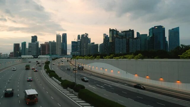 Sunset Scene of Downtown Singapore with Traffic Car City Timelapse. The Marina Coastal Expressway (MCE) is a key underground expressway in Singapore, spanning approximately 5 kilometres.